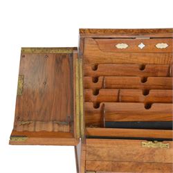 19th century burr walnut correspondence box, the sloped front opening to reveal a fitted interior with perpetual calendar, letter racks, and pen tray between two inkwell recesses, above a pull out draw with recessed brass handle, H41cm L40.5cm D28.5cm