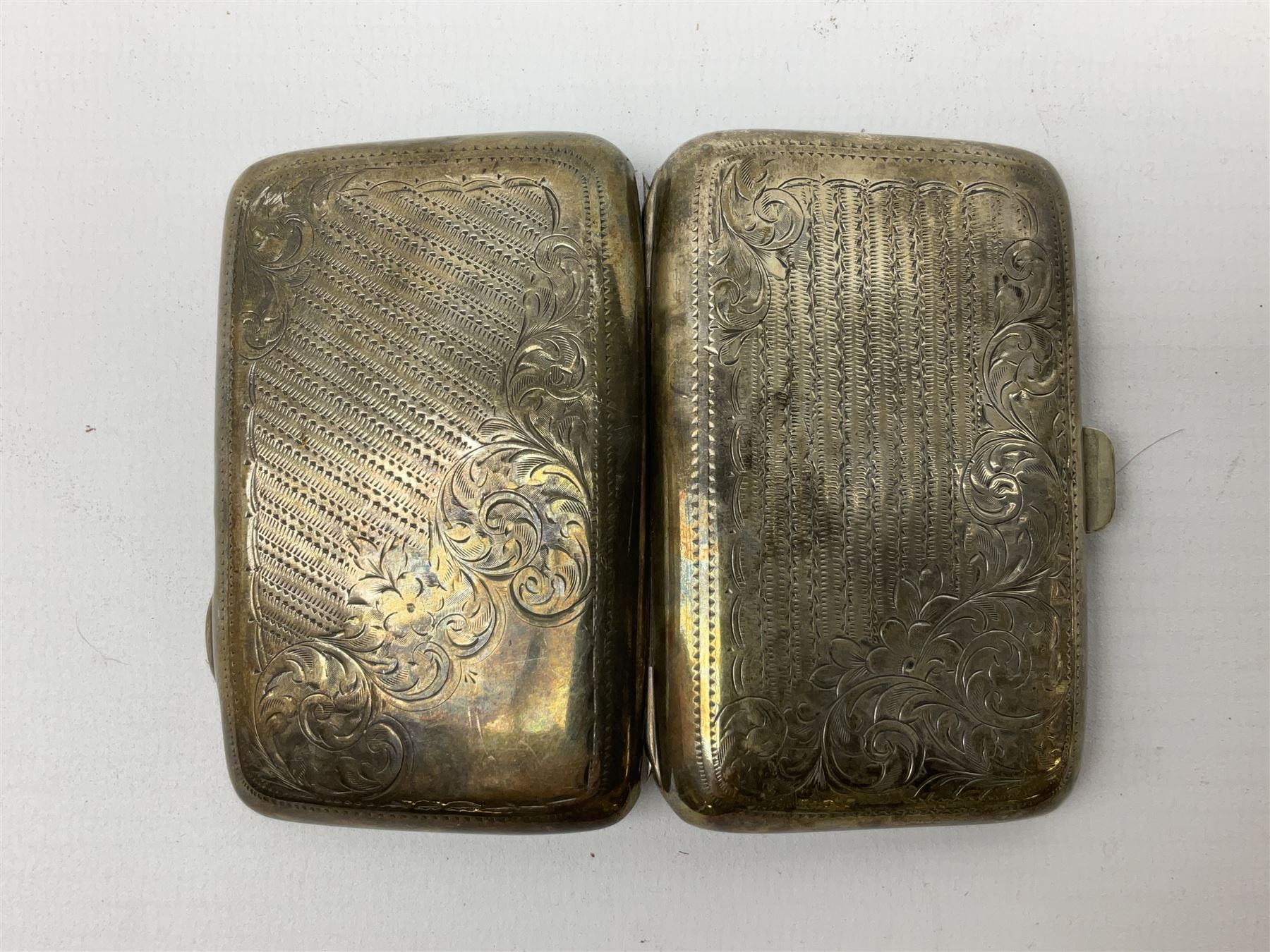 20th century engine turned silver propelling pencil by Johnson, Matthey & Co, stamped London 1956, together with silver cigarette case stamped Birmingham 1904 with engraved foliate decoration, total weight 74g