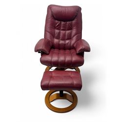 Contemporary burgundy leather reclining armchair and footstool, featuring segmented upholstered cushions and padded armrests, each piece mounted on a circular laminated wood base