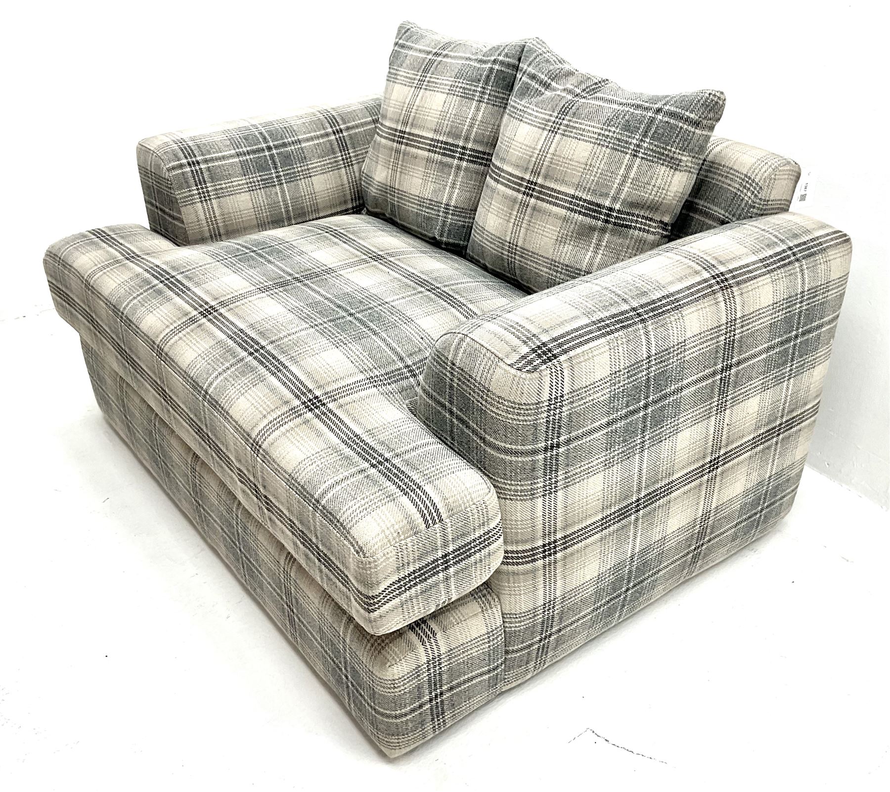 Next snuggler sofa upholstered in check fabric 
