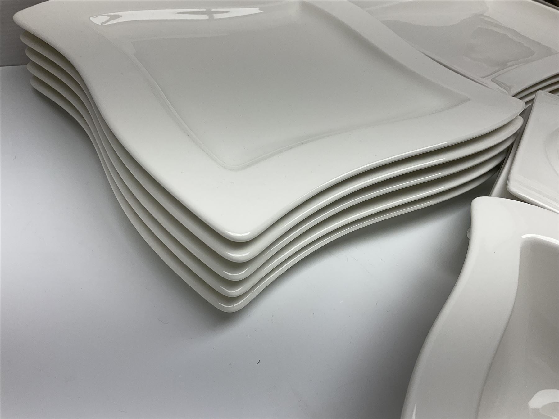 Villeroy & Boch New Wave pattern dinner and tea service for five people, comprising square dinner plates, rectangular dinner plates, pasta bowls, cereal bowls, coffee cups and saucers, side plates and dessert plates, all with printed mark beneath