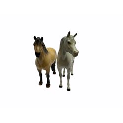 Beswick horse figures, comprising Highland Pony 1644, and another, probably Aran Bahram in grey, each with printed mark beneath.

