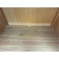 Laura Ashley - contemporary Milton oak display cabinet, featuring single door with two glass panels and pewter effect handle, enclosing one fixed oak shelf and two adjustable glass shelves, access hole at the bottom shelf, over single drawer with matching handle, on square legs