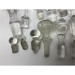 Quantity of glass decanter stoppers, of varying style and size, including hand blown and cut glass examples