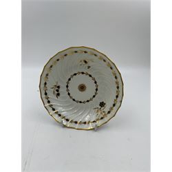 18th century Caughley blue and white sparrow jug, decorated in the Mother and Child pattern, circa 1780-1790, with underglaze C mark beneath, H9cm, together with a Worcester coffee cup, circa 1785 painted with floral sprays in underglaze blue and gilt, with crescent mark beneath, and a Caughley trio of tea cup, tea bowl and saucer, each of moulded wrythen fluted form and decorated with gilt and blue sprigs and bands, each with crescent mark beneath, (5)