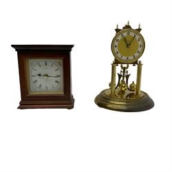 400 day anniversary clock and a quartz mantle clock