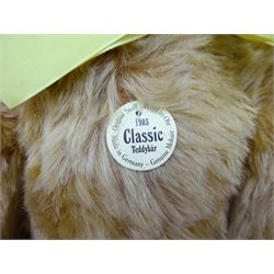Steiff Replica 1903 Classic teddy bear, the golden mohair body with press squeaker and card tag No.000201 H21