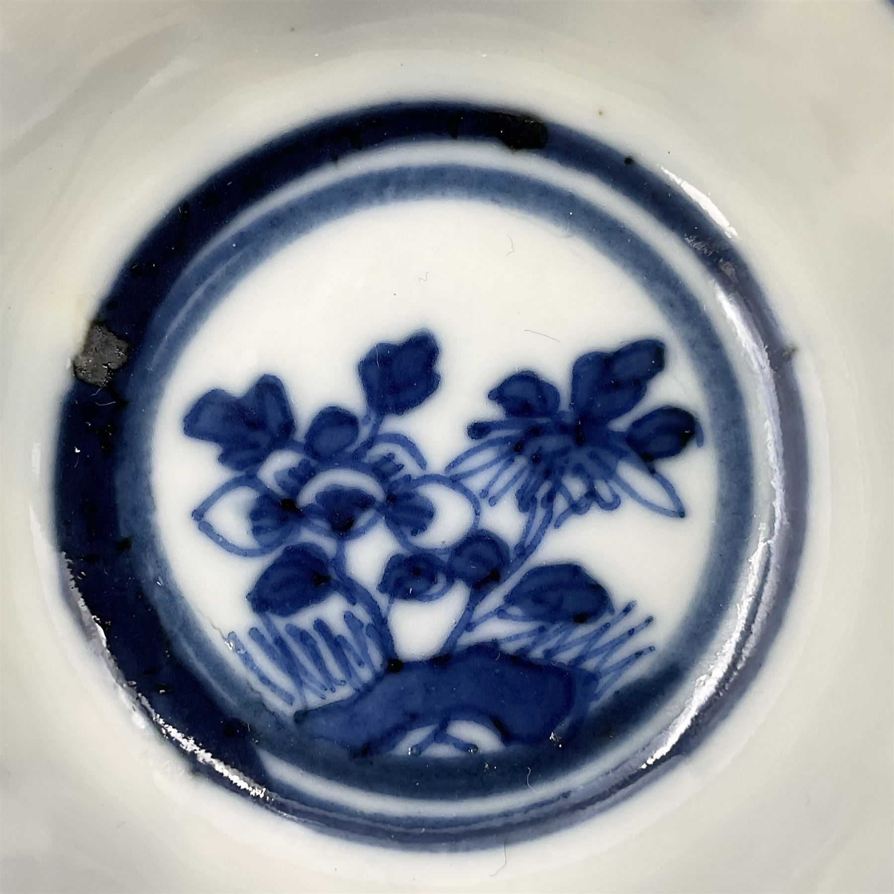 18th century Chinese blue and white Kangxi teacup and saucer, decorated with dancing figures, four character Kangxi mark beneath, saucer D10cm