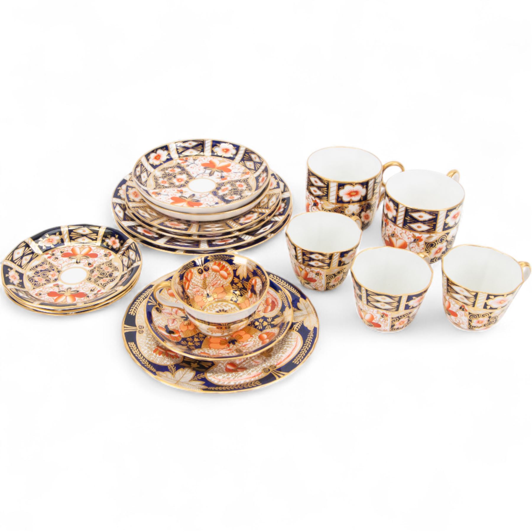 Royal Crown Derby teacups, comprising 4971 Imari pattern trio, two Imari 2541 trios and three Imari pattern 2541 cups and saucers