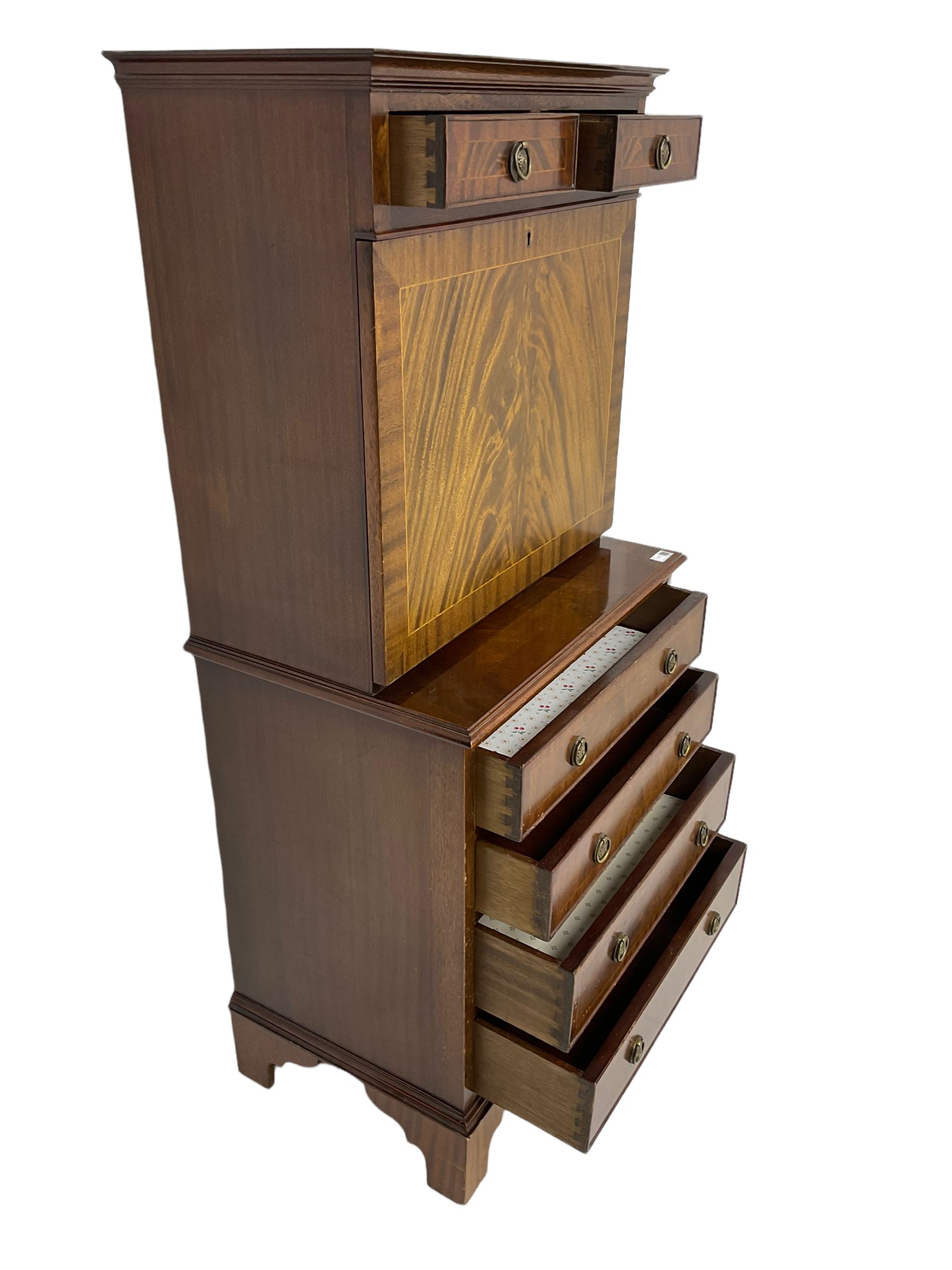 Shaw of London - mahogany secretaire chest, the upper section fitted with two drawers over fall front enclosing drawers, cupboard and pigeon holes, the lower section fitted with four graduating drawers, on bracket feet