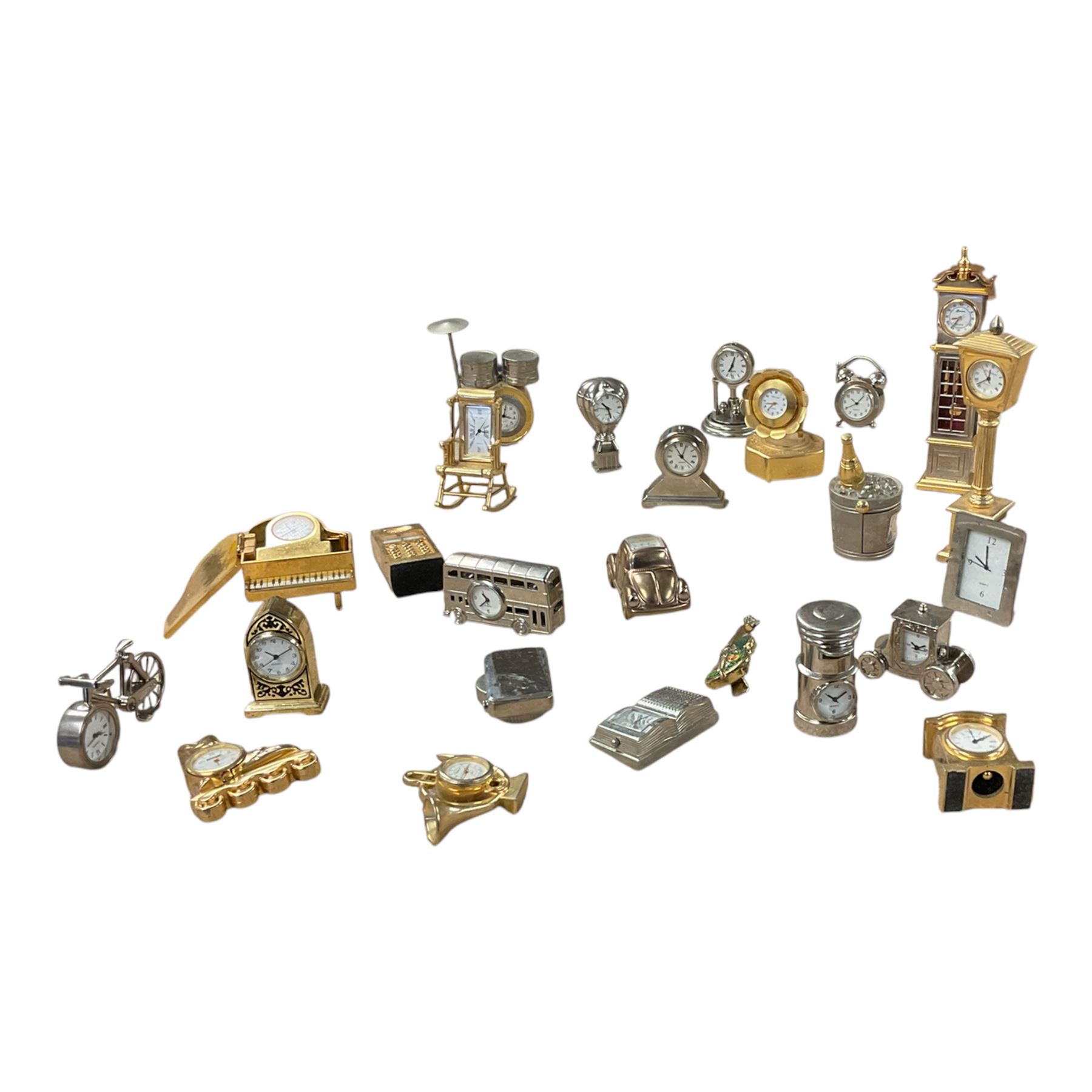 Collection of miniature novelty clocks 