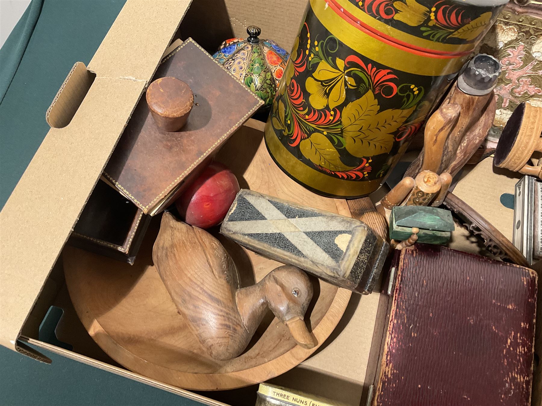 Indian bone box, leather pen tray and blotter, wooden duck, various carvings etc, in one box 