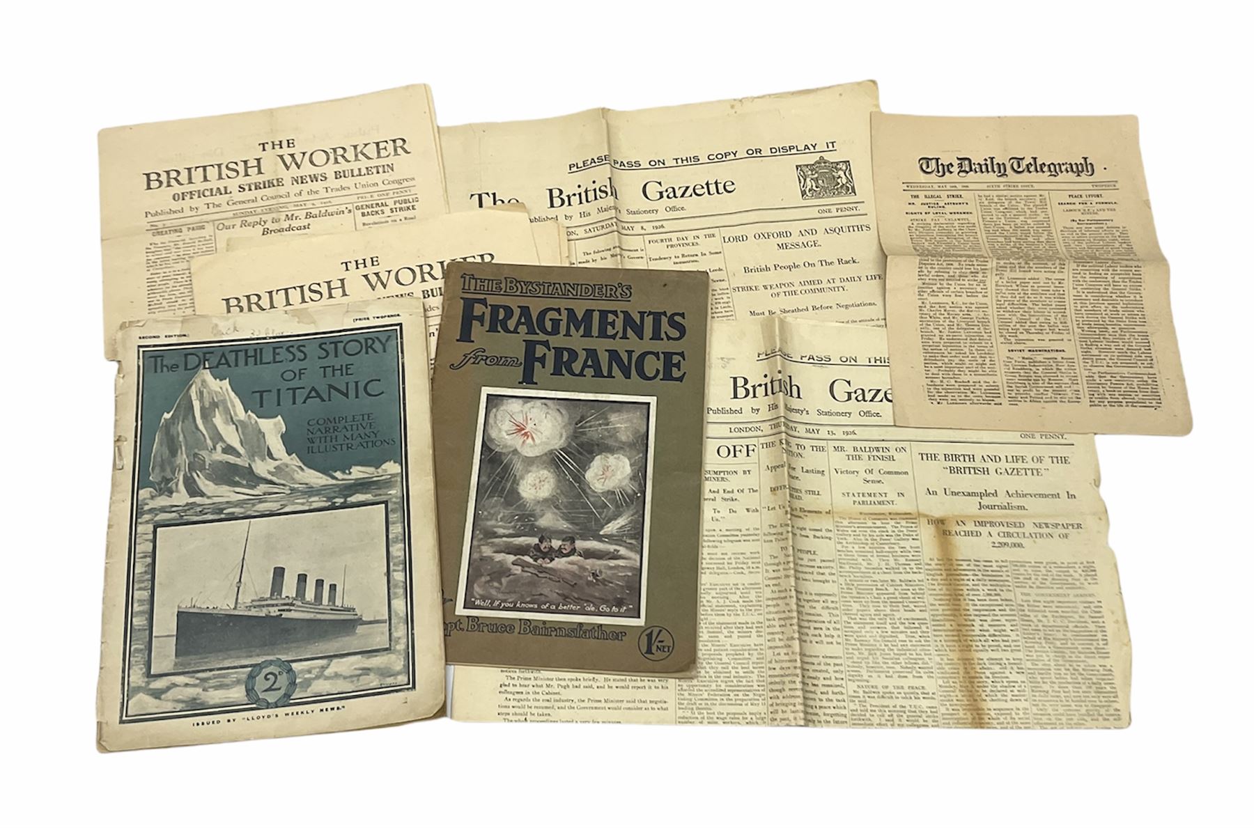 Titanic interest: Lloyds Weekly magazine 'The Deathless Story of the Titanic'. Second edition. A4 size. 'Complete Narrative with Many Illustrations'; together with Bruce Bairnsfather's 'The Bystander's Fragments from France'; and small quantity of newspapers relating to the General Strike in 1926