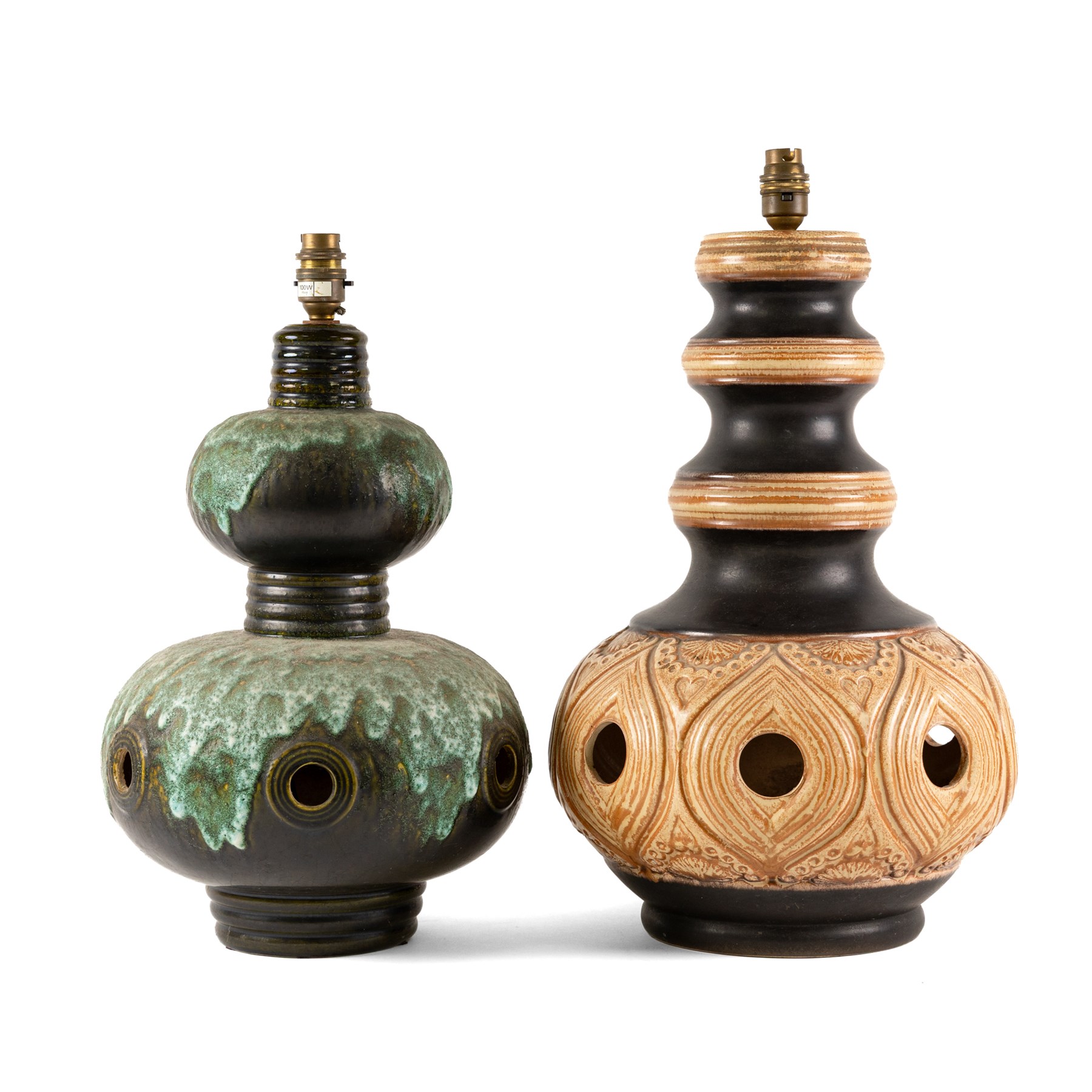 West German Pottery - two mid 20th century ceramic lamp bases, brown glaze with petal style decoration and pierced detail, together with another similar with volcanic glaze, largest H52cm