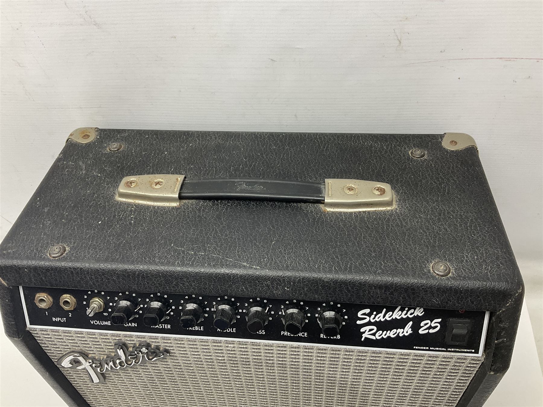 Aria Sinsonido mahogany electric travel guitar, serial no.0502385 L86cm; in original gig bag with earphones and GM11 Minituner; together with Fender Sidekick Reverb 25 amplifier and Marshall MG Series 15DFX amplifier (3)