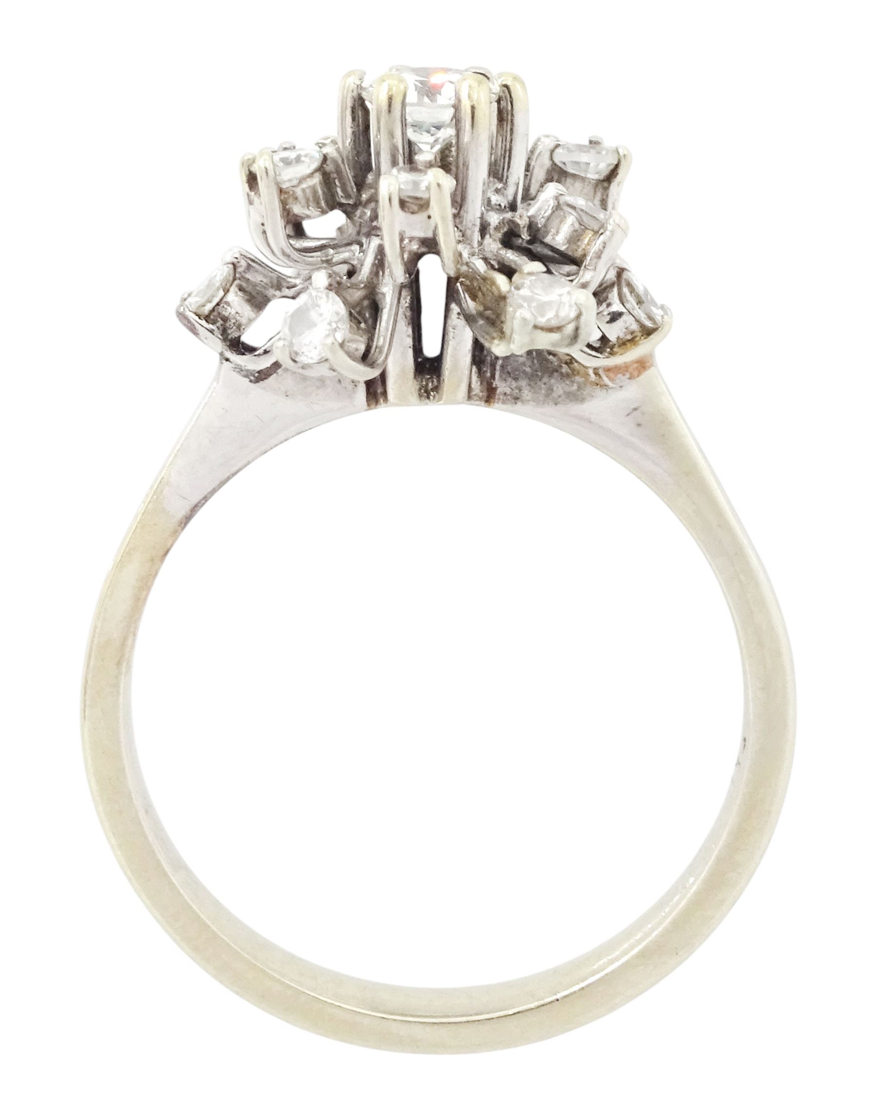 18ct gold diamond cluster ring, the principal round brilliant cut diamond of approx 0.20 carat, surrounded by twelve round brilliant cut diamonds, total diamond wight 0.58 carat