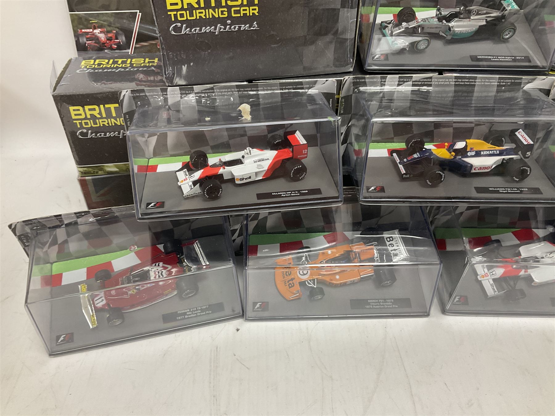 Panini Formula 1 The Car Collection - twelve blister packed racing cars and quantity of periodicals; nine mostly unopened Atlas Editions British Touring Car Champions; and six other boxed/blister packed die-cast models of racing cars