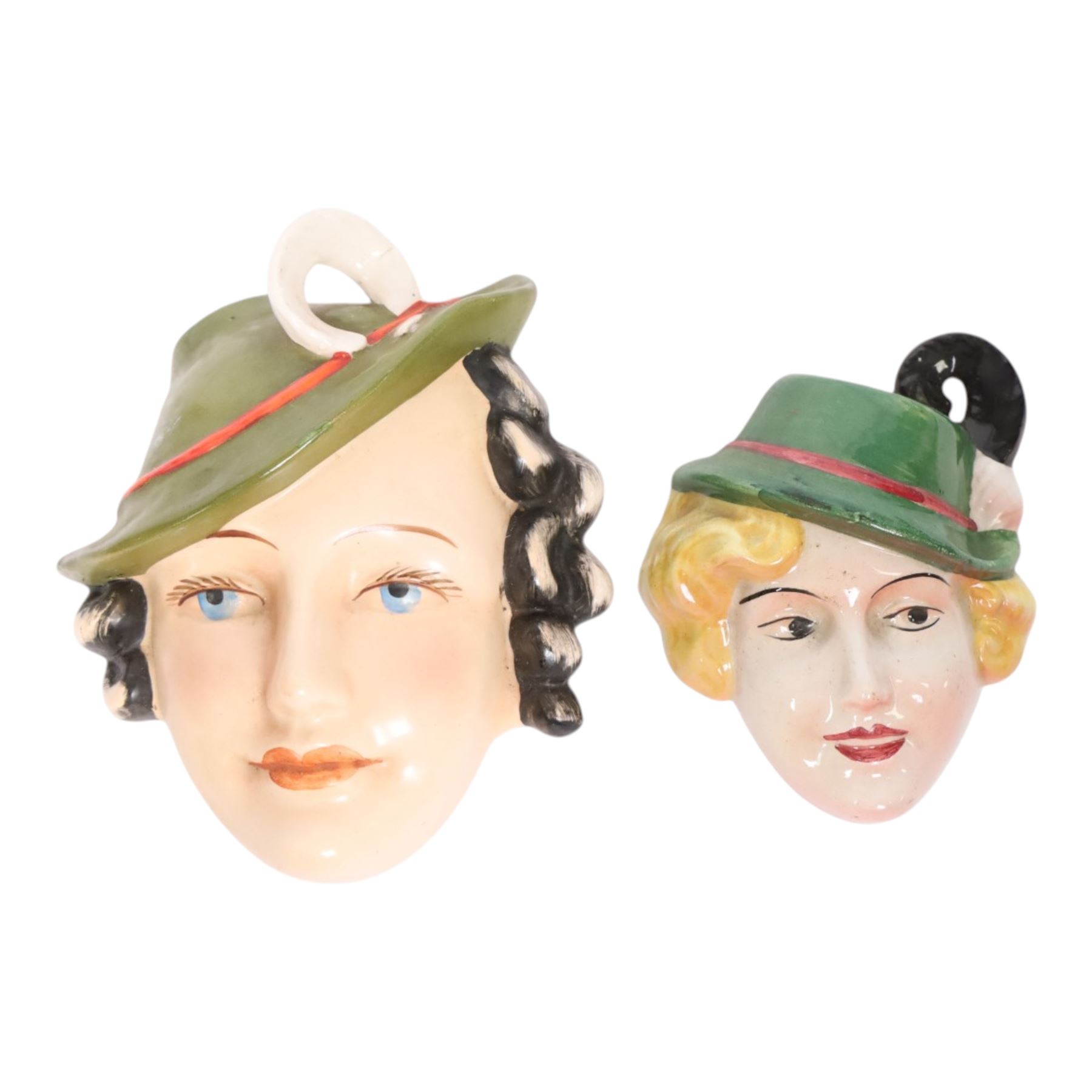 Goebel Art Deco wall mask, Lady in Tyrolean Hat, with impressed mark, together with a similar C & Co example 