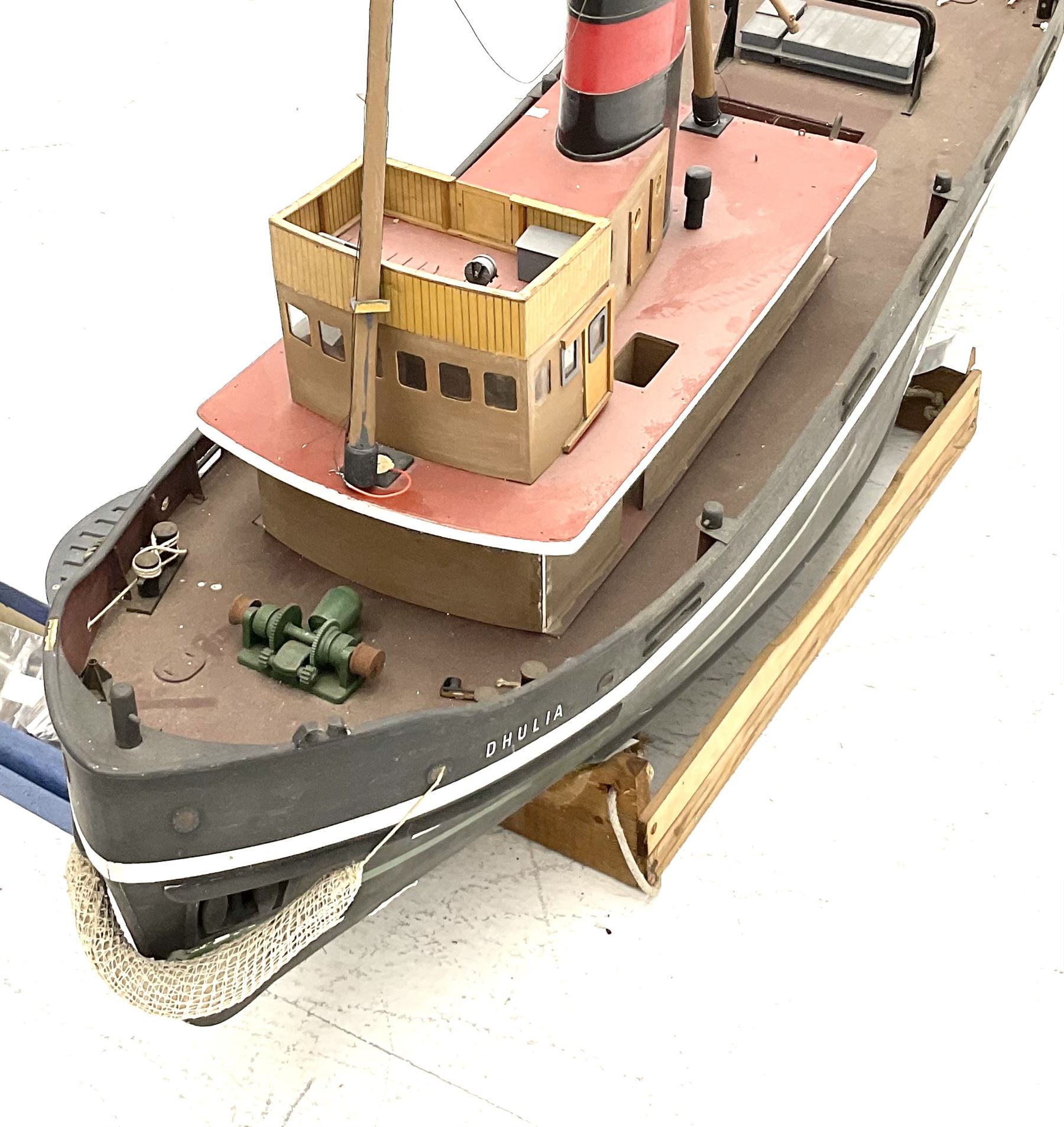 Large model of the tugboat 'Dhulia' on a wooden stand L144cm, together with a box of additional parts and plans