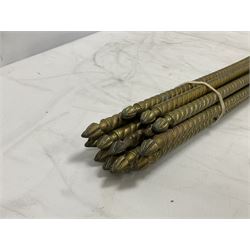Group of brass stair rods of wrythen twist form, L82cm
