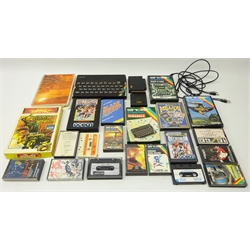  Sinclair ZX Spectrum console with games including blade runner, scrabble, flight simulator etc  