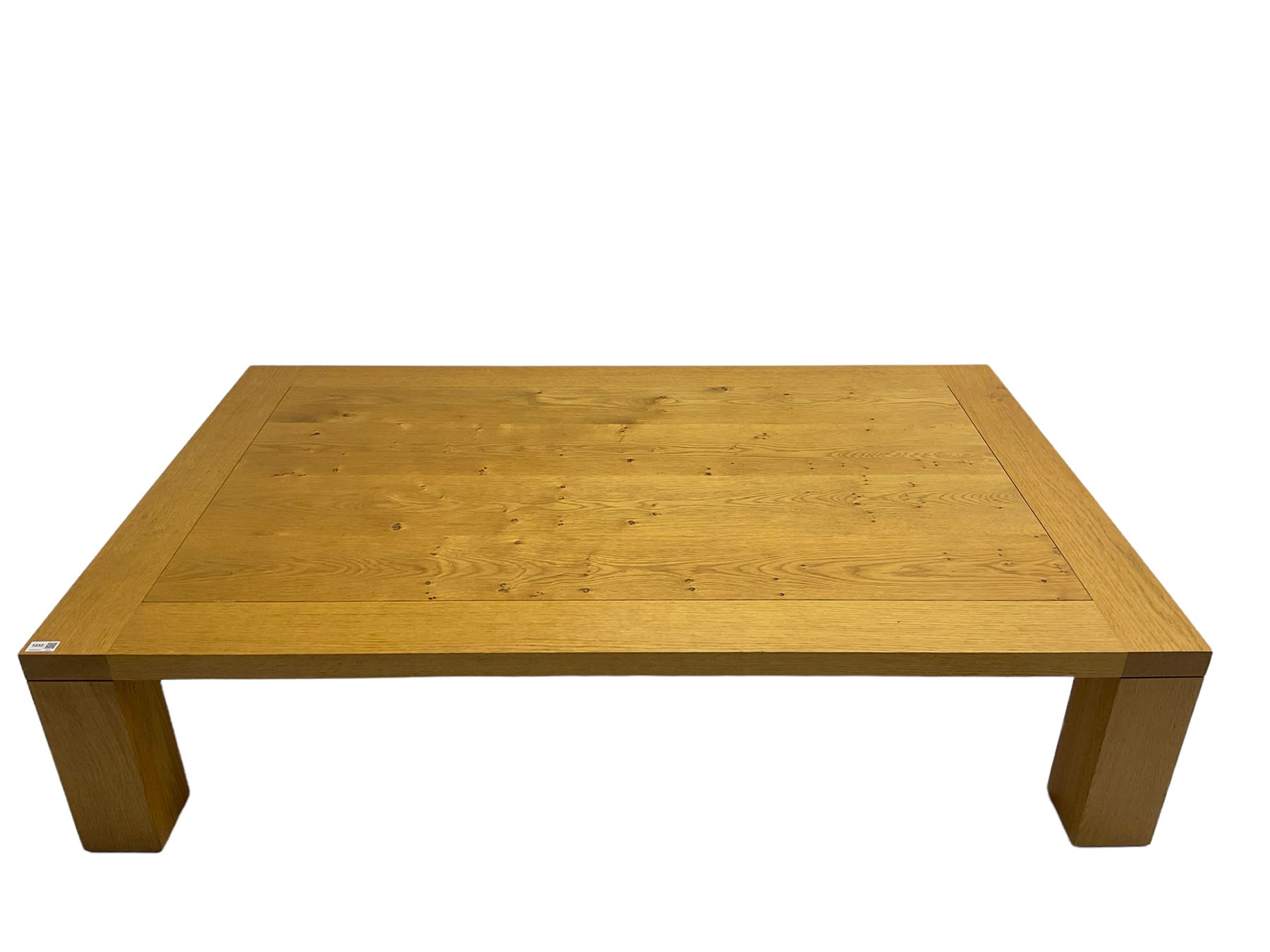 Large pippy oak rectangular coffee table, square block leg, retailed by Chapmans of Newcastle