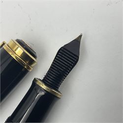 Pelikan M800 Souveran fountain pen, the green and black striped barrel with gilt beak shaped clip and double cap band with gold bi-colour nib stamped 18C-750, L13.5cm