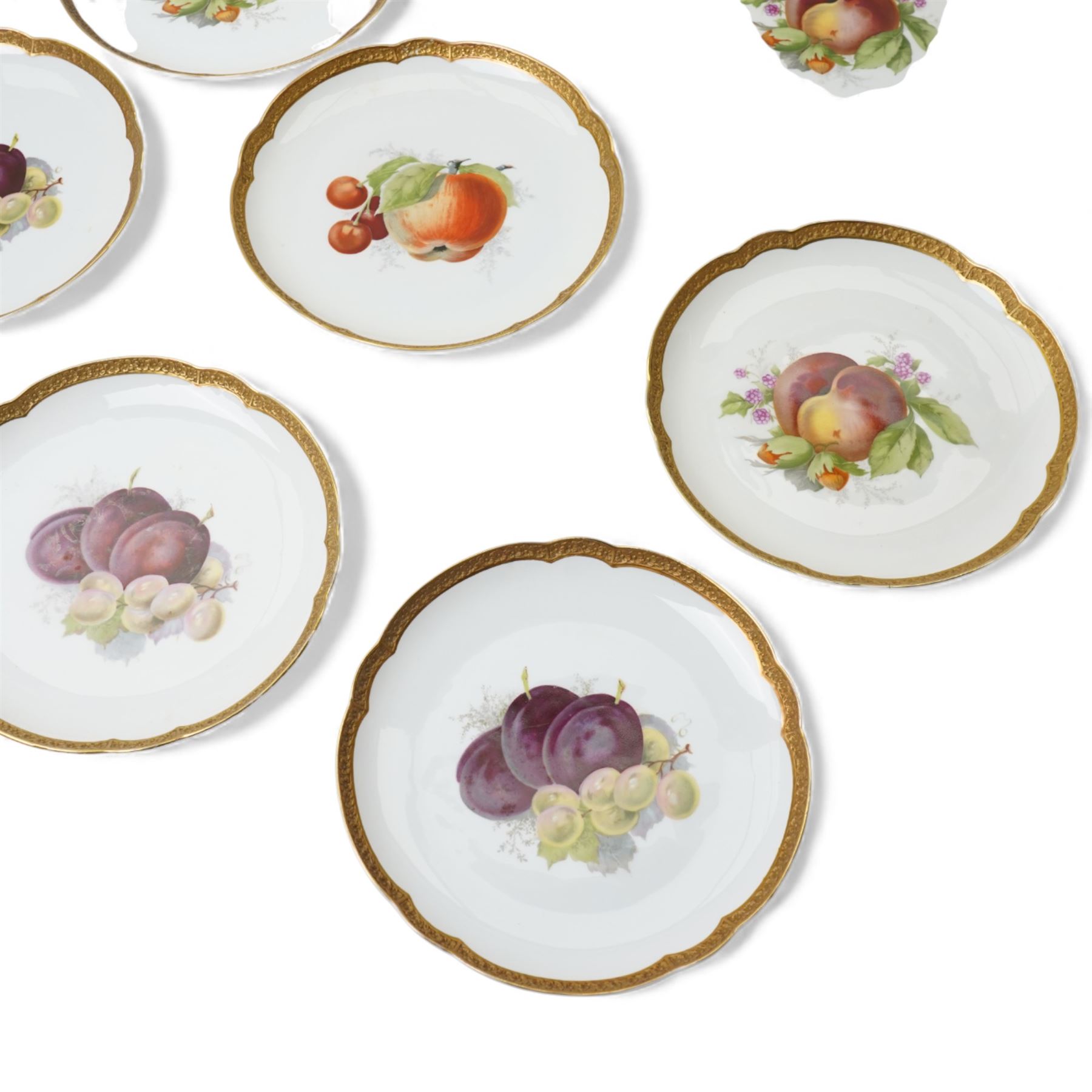 Set of thirteen Rosenthal hand-painted fruit decorated cabinet plates, within floral gilt borders, printed marks to base 