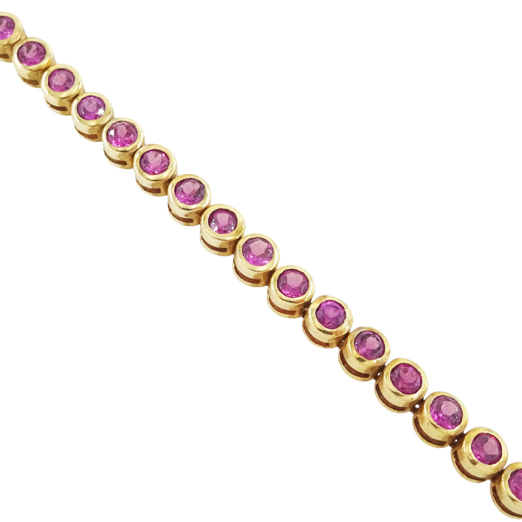 9ct gold garnet bracelet, bezel set with forty-four round cut garnets, hallmarked