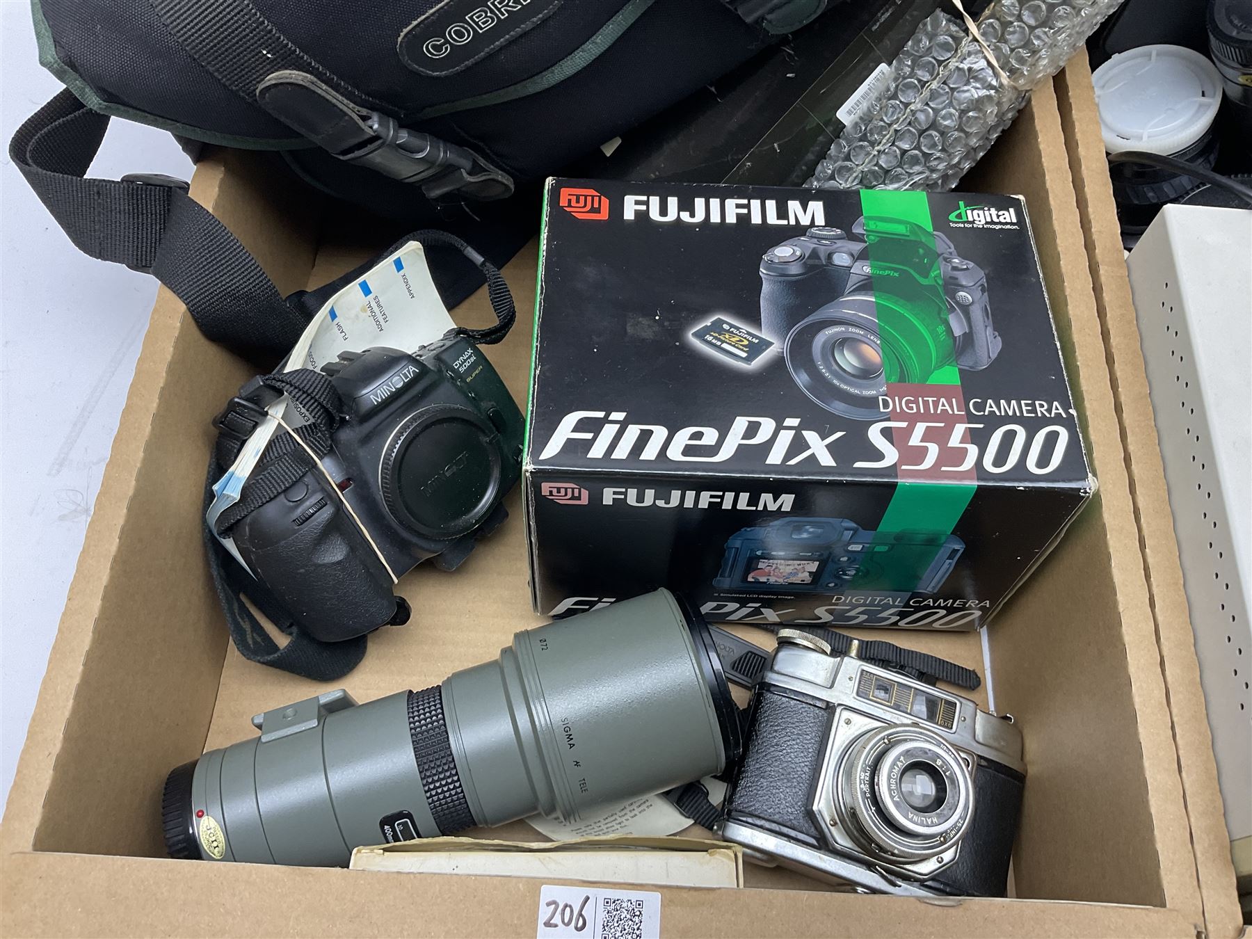 Cameras and related equipment including Fujifilm FinePix S5500, Minolta and other lenses, various camera bodies, soft case camera bag etc and a pair of Aico 10X50 binoculars, in two boxes (all untested)