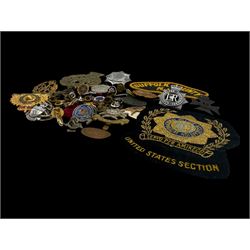 Collection of military and similar enamel badges, pin badges, cloth badges and brasses