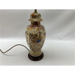 Table lamp of baluster form, decorated in the Oriental style with phoenix and dragon amidst blossoming flowers, with plated cream fabric shade, lamp base not including fixtures H35cm