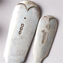 Silver Fiddle pattern canteen, composite, largely Victorian, comprising twelve table spoons, twelve table forks, twelve dessert spoons, eleven dessert forks, one soup ladle, one sauce ladle, and one serving spoon, each terminal engraved with The Everitt family Griffin crest, largely hallmarked Francis Higgins III, London 1892, soup and sauce ladle dated 1808 and 1828 

Provenance: From the collection of Andrew Chichester Everitt.



