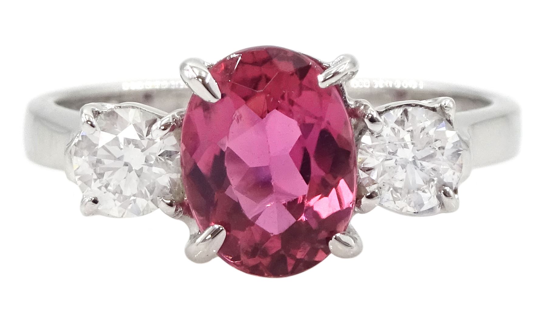 18ct white gold three stone oval cut pink tourmaline and round brilliant cut diamond ring, hallmarked, tourmaline approx 2.60 carat, total diamond weight approx 0.40 carat