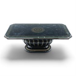 Italian Neoclassical inspired ebonised gloss coffee table, glazed cantered top with Greek key banding, on a shaped pedestal base with gilt highlights and stepped plinth 
