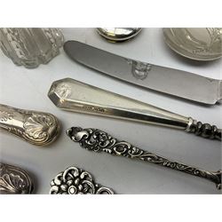 Group of glass silver collared and lidded jars, two Cooper Brothers & Sons Ltd hallmarked silver handled knives, silver handled button hook by Hasset & Harper Ltd, spoons etc