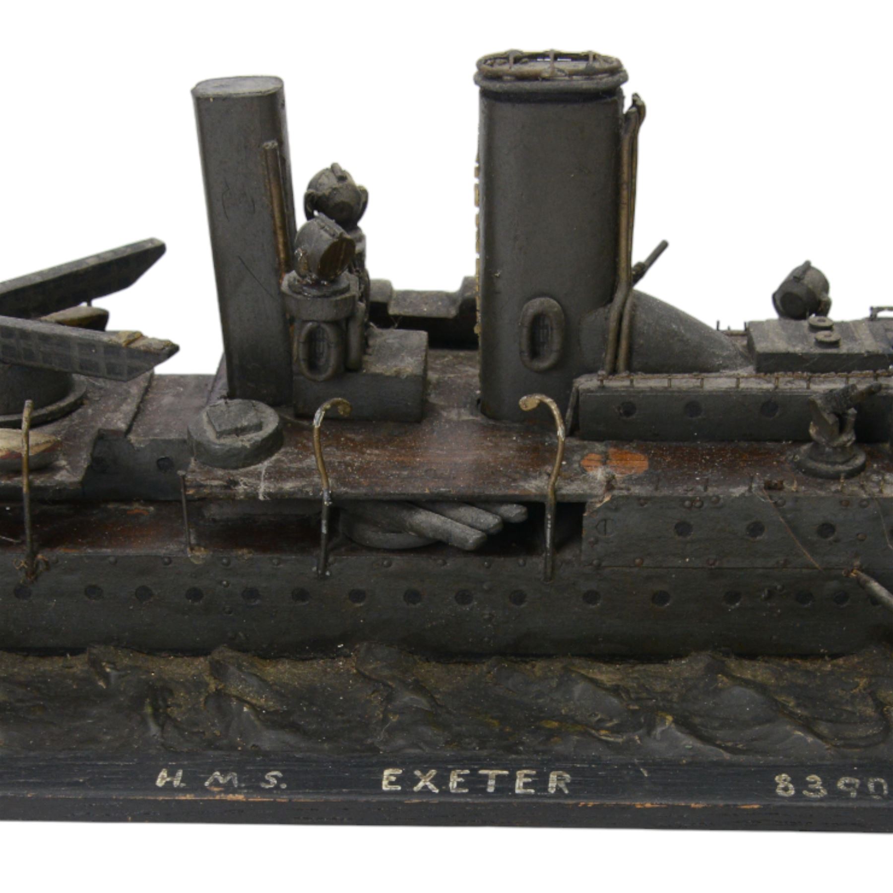  HMS Exeter, Waterline wartime metal model upon a wooden base, circa 1939-45, H24cm, L82cm  