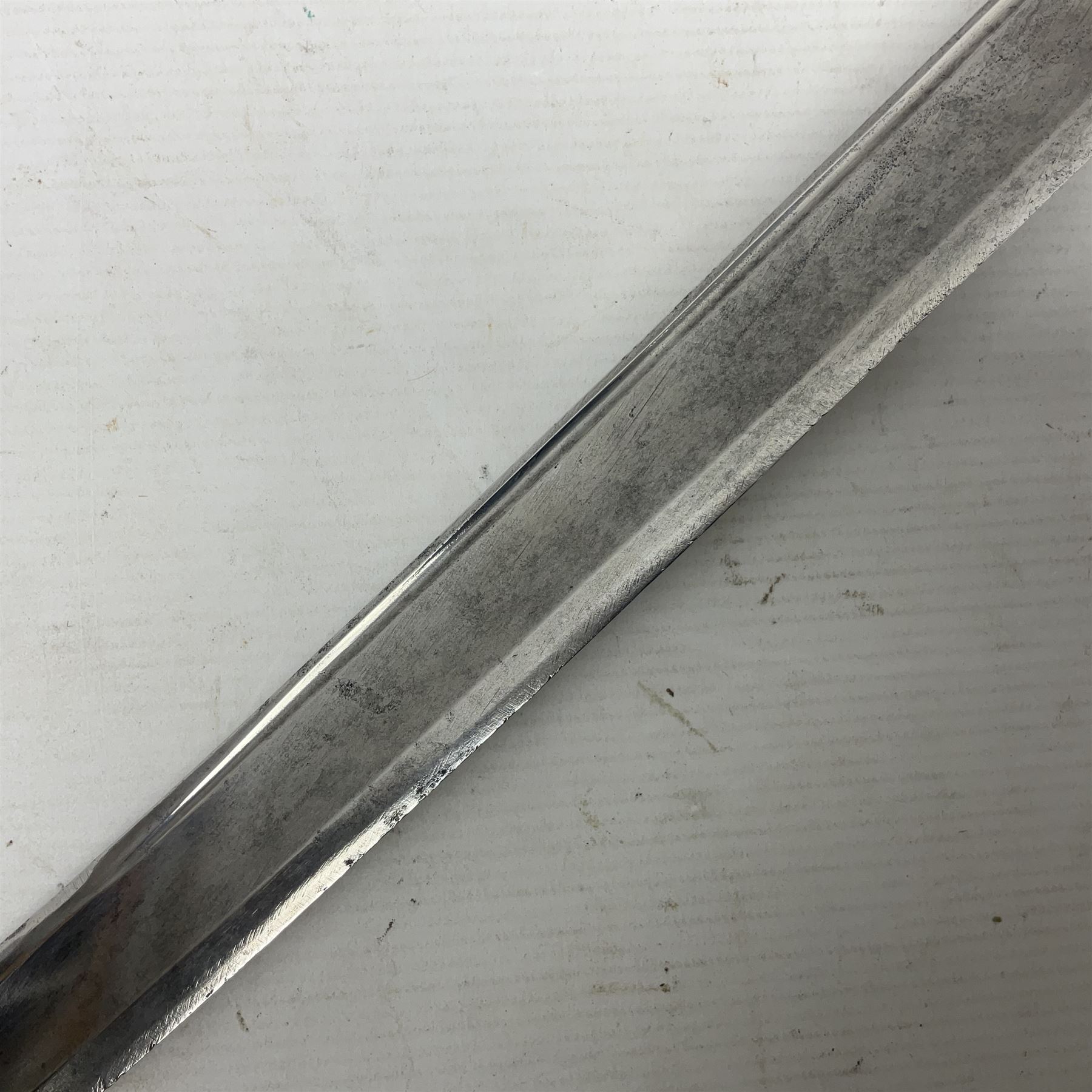 Late 18th century French 1st Empire Troupe a Pied Petit Montmorency Branch Tournante officer's sword, with 72.5cm slightly curving fullered blade, pierced brass hilt with lockable swivelling bar, fully wire-bound grip with lion head pommel, L88cm overall (no scabbard)