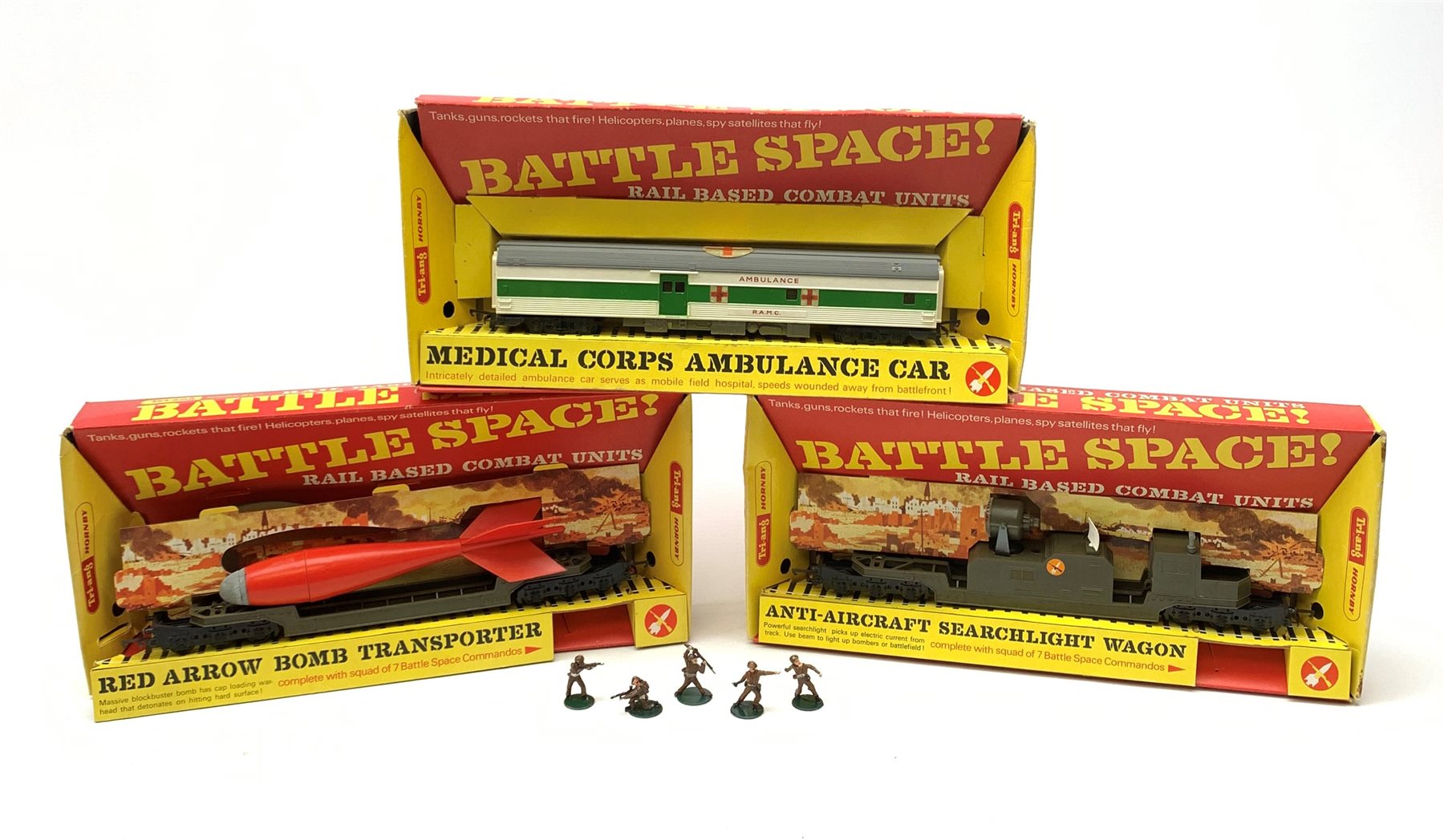 Tri-ang/Hornby '00' gauge - Battle Space Medical Corps Ambulance Car, Red Arrow Bomb Transporter and Anti-Aircraft Searchlight Wagon; with five Battle Space Commando figures, all boxed, one with cardboard slip-case (3)
