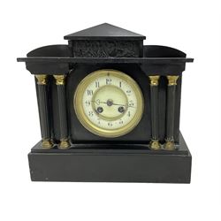 French - late 19th century 8-day mantle clock in a Belgium slate case, with an architectural pediment and classical relief from Greek mythology to the tympanum, with four recessed pillars and brass capitals to the front, two part enamel dial with Arabic numerals and steel trefoil hands, with a rack striking movement, striking the hours and half hours on a coiled gong.
With pendulum. 