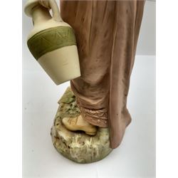 Royal Dux figure no. 686, modelled as a female water carrier, carrying two urns and wearing flowing green and pink robes, with applied pink triangle mark beneath, H61cm
