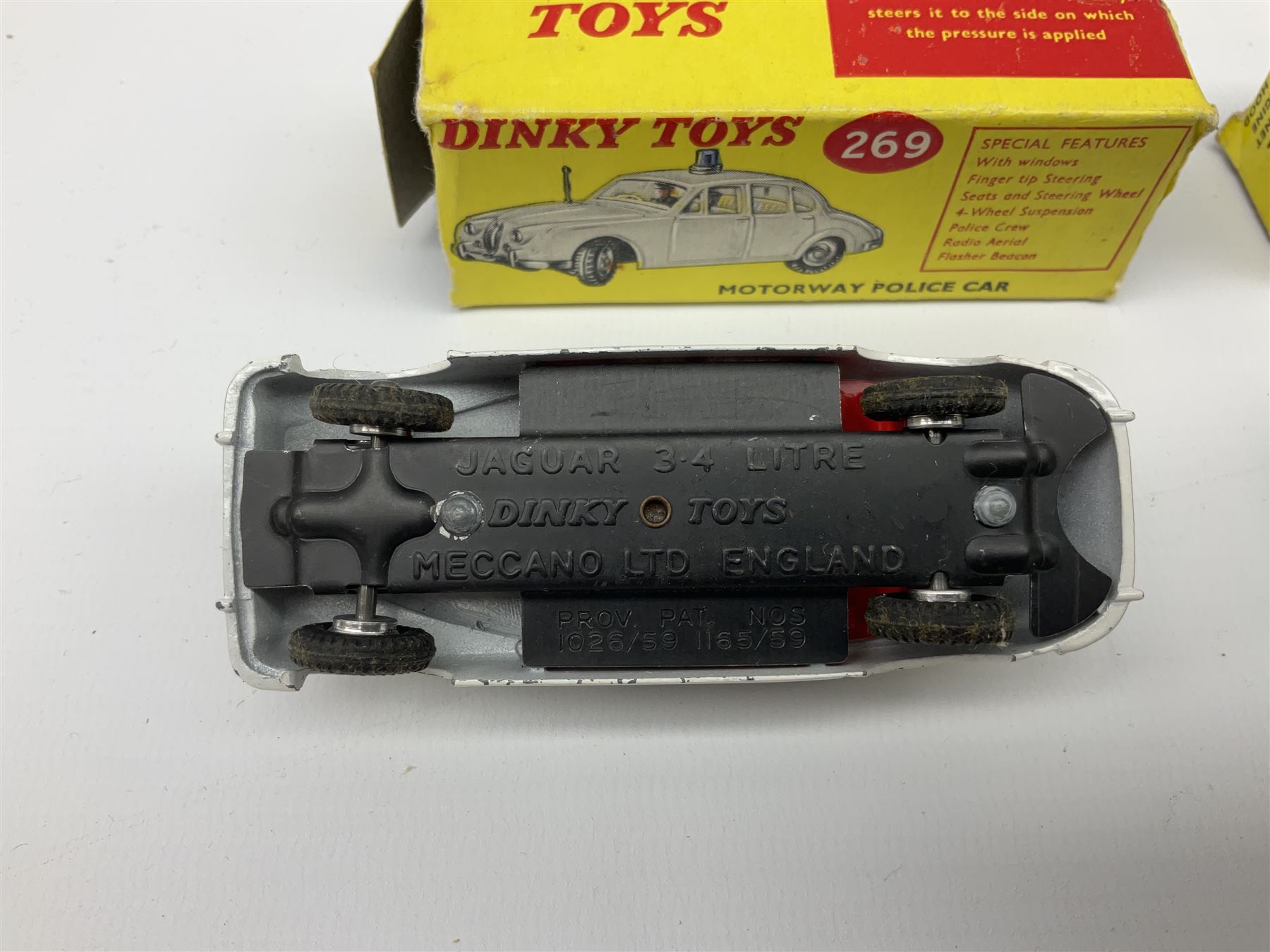 Dinky - Mercedes Benz Racing Car RN 36, No.237; Motorway Police Car No.269; Austin Mini-Moke No.342; Beechcraft S 35 Bonanza Aircraft with two pieces of luggage No.710; all boxed: and Rolls Royce Phantom V Limousine No.152; box base only with no cover (5)