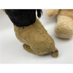 Mid-20th century English plush covered woodwool filled dog with vertically stitched nose and mouth L39cm; and Wendy Boston plush covered teddy bear, the fixed head with applied eyes and vertically stitched nose and mouth H63cm (2)