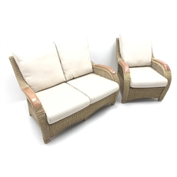  Two seat wicker conservatory sofa, upholstered back and seat (W125cm) and matching armchair (W73cm) (2)  