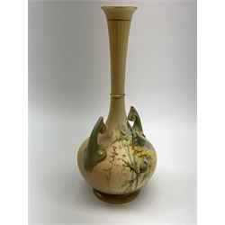 Royal Worcester blush ivory vase, the bulbous body with twin flying handles and tall tapering neck, hand painted with flowers, shape number 1761, 24cm high. 