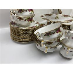 Royal Albert Old Country Roses pattern tea and dinner wares, comprising teapot, coffee pot, milk jug, sugar bowl, six teacups and saucers, cake stand, serving bowl, twin handled tureen, platter, six dinner plates, six side plates, four twin handled soup bowls, sauce boat etc (71)