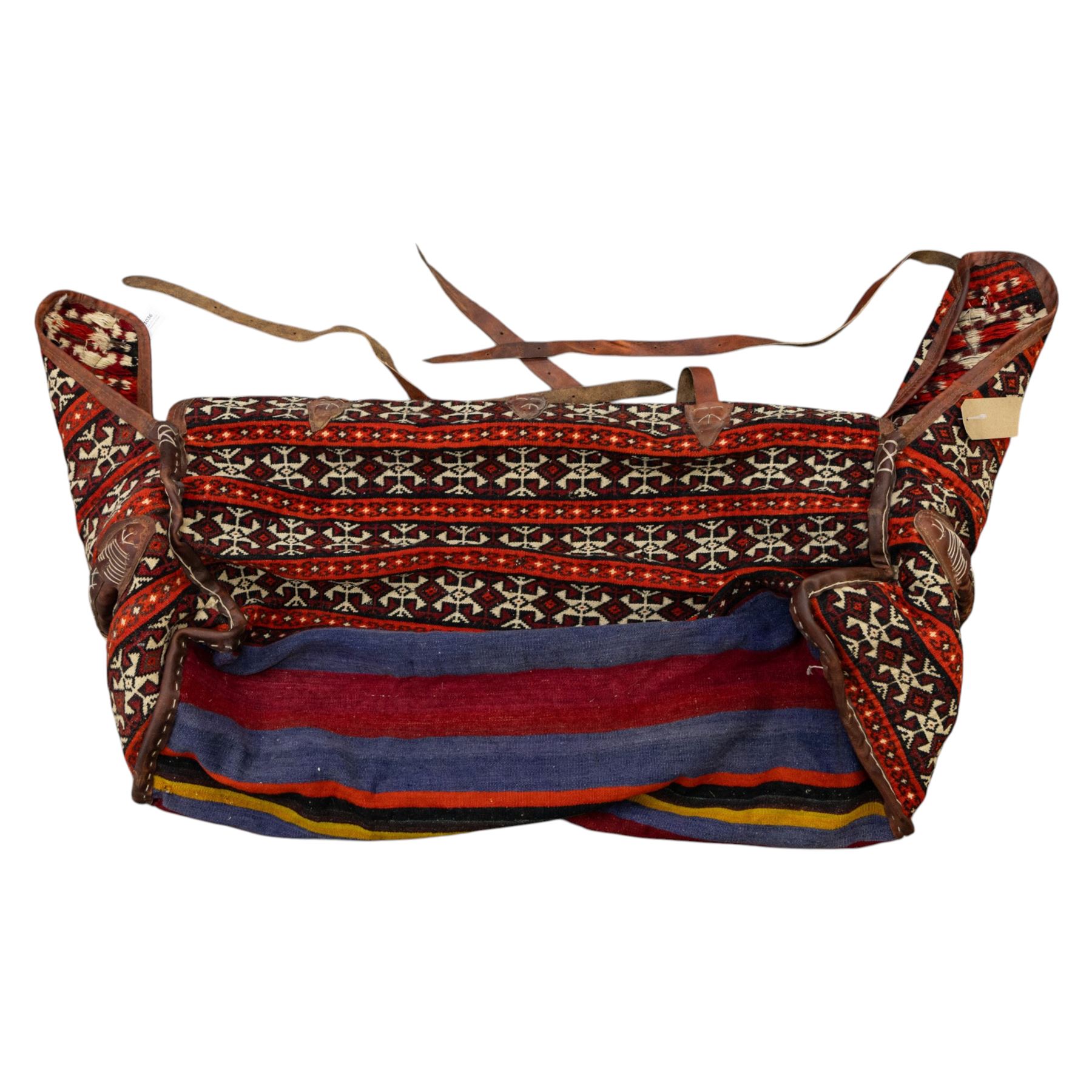 South West Persian Qashqai bag, woven body decorated with bands of geometric motifs in red, ivory and dark tones, with leather fittings and straps, underside with flatweave stripped bands 