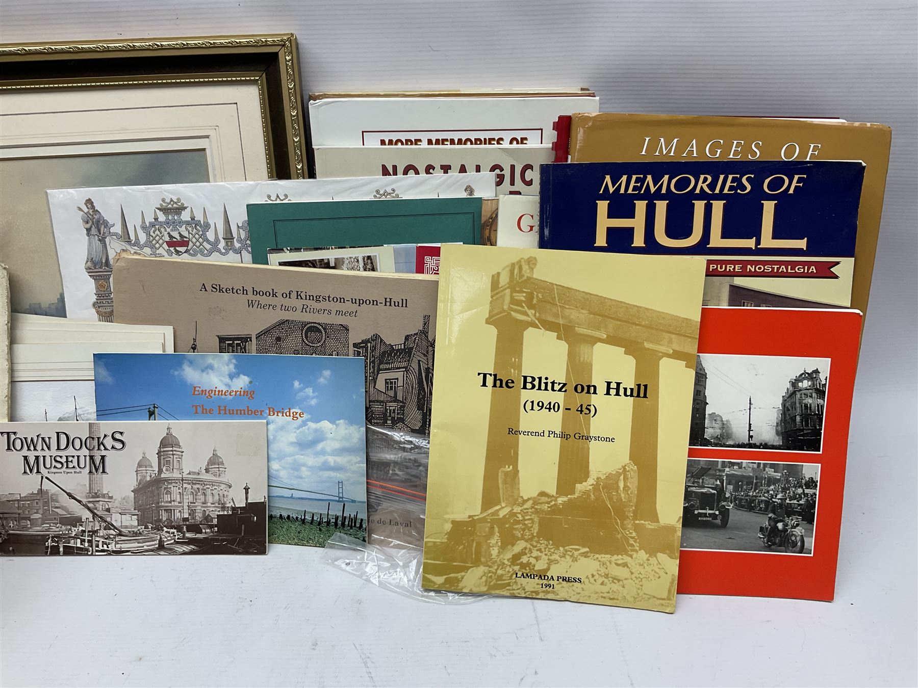 W. Marshall (20th century) - Town Dock Hull; watercolour; gilt frame; two Amy Johnson enamelled brooches as aircraft and Amy Johnson medallion; and quantity of books and booklets of Hull interest