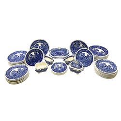 Copeland Spode's Tower pattern part dinner service, comprising  ten dinner plates, twenty two salad plates, six side plates, twelve bowls, tureen and cover, two sauce tureens (one with cover), and two sauce boats