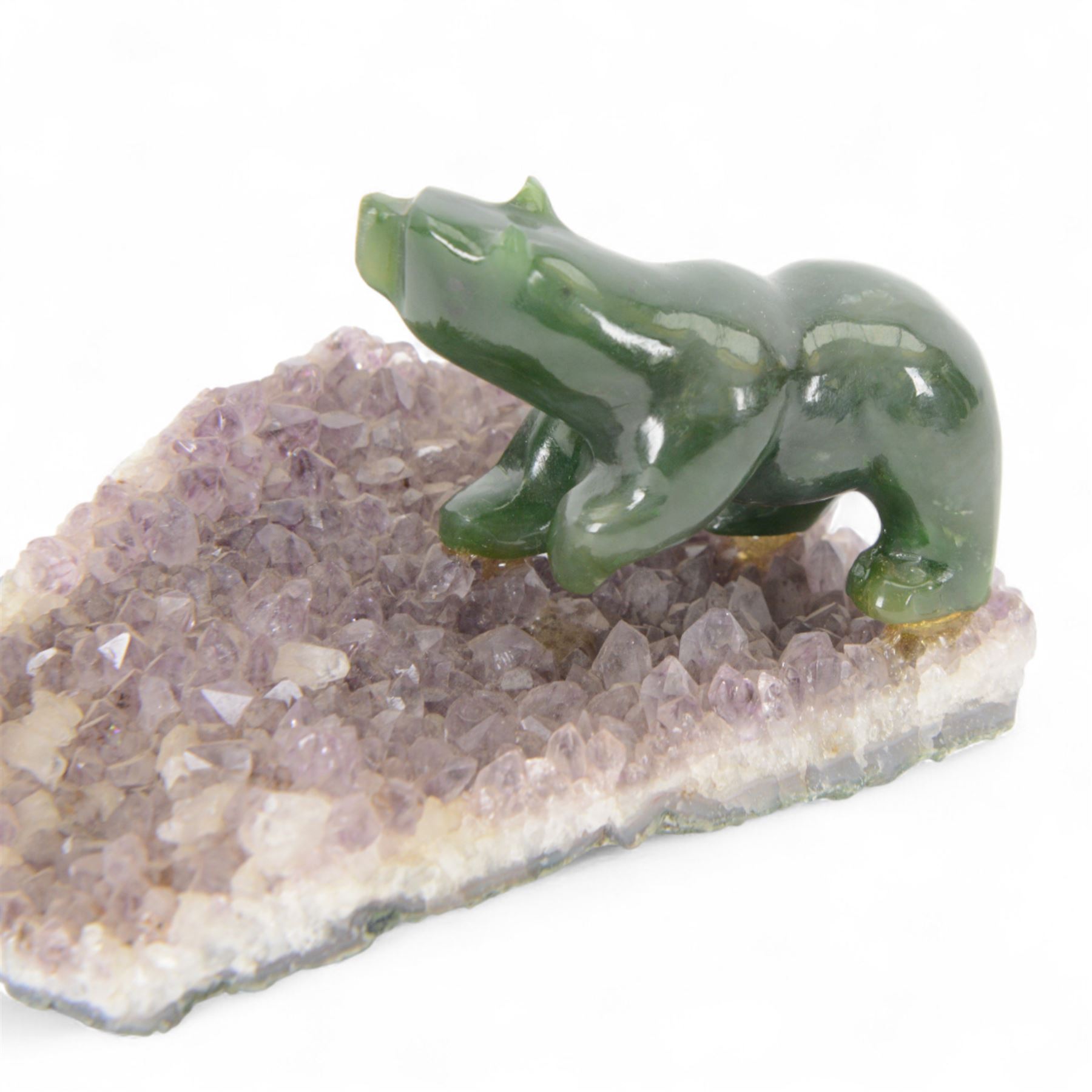 Inuit jade bear, upon an amethyst geode base, H7cm, L12cm